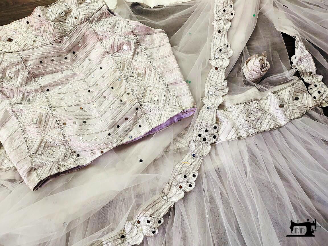 White heavy soft net designer saree