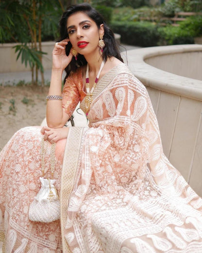 White heavy soft net embroidered saree