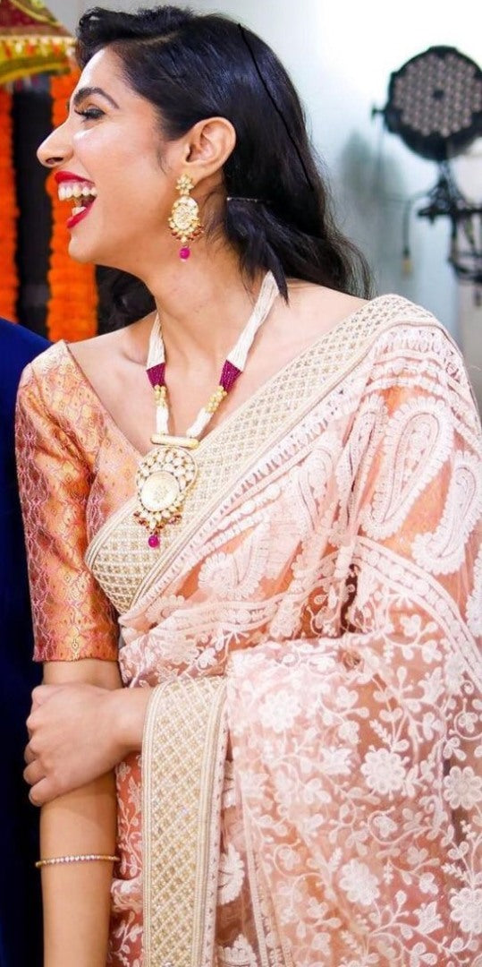 White heavy soft net embroidered saree