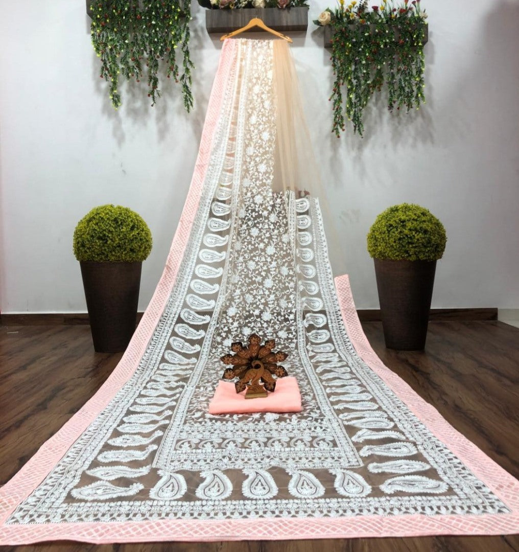 White heavy soft net embroidered saree