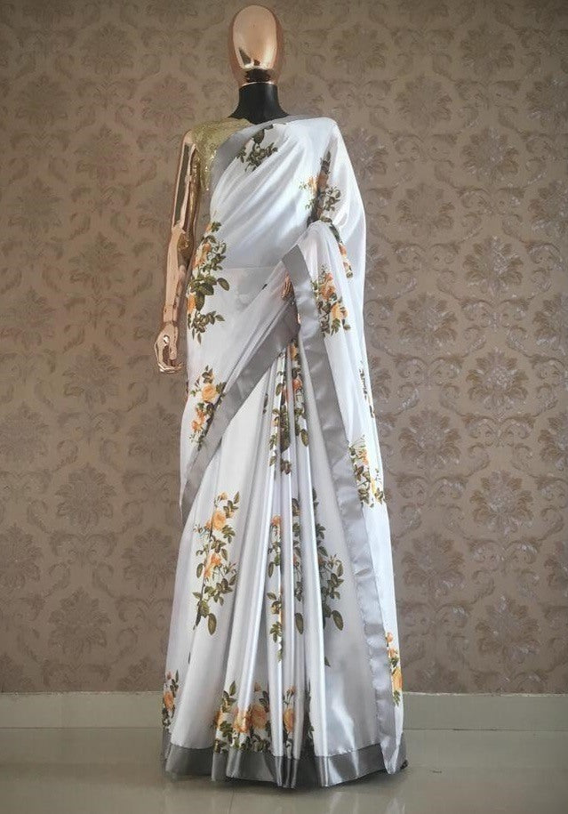 White japan satin yellow flower printed saree with sequence work blouse