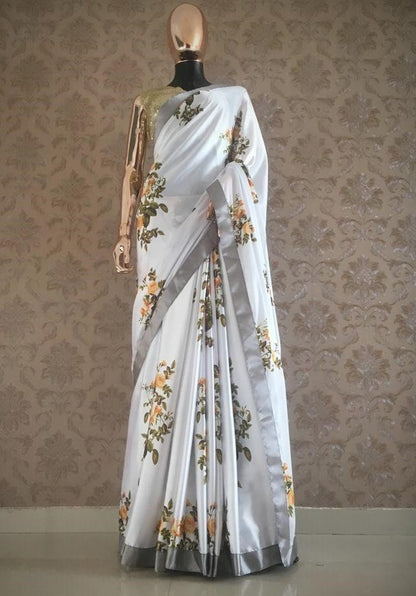 White japan satin yellow flower printed saree with sequence work blouse