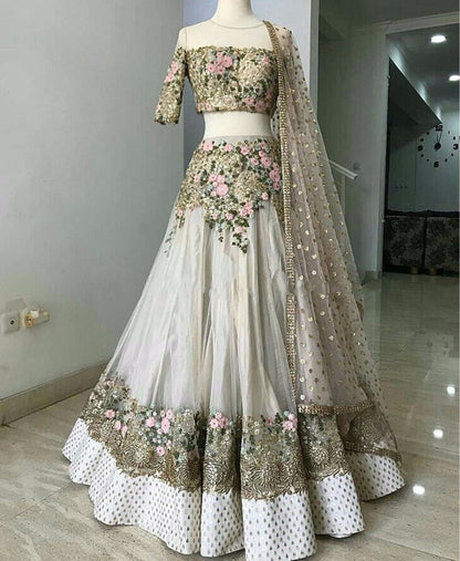 white mono net embroidered ceremonial lehenga
