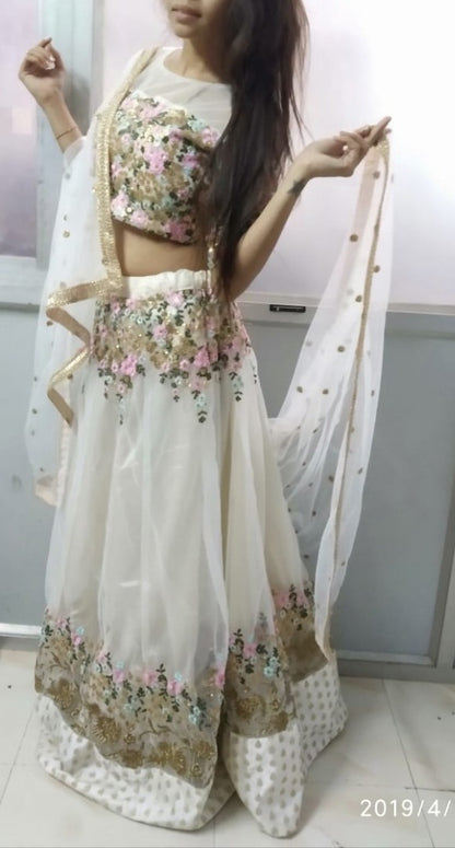 white mono net embroidered ceremonial lehenga