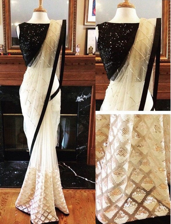white mono net embroidered partywear saree