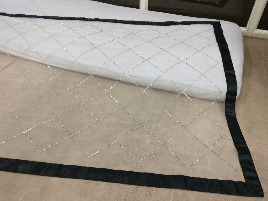 white mono net embroidered partywear saree