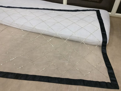 white mono net embroidered partywear saree