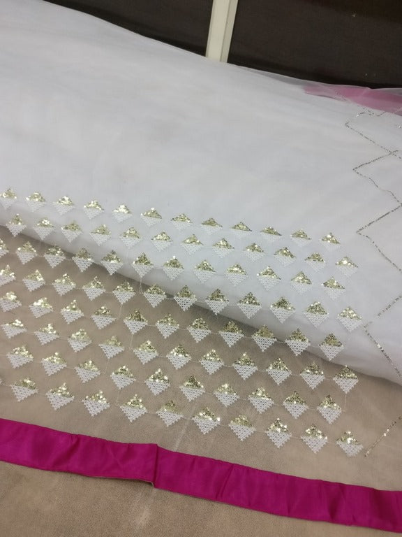 white mono net embroidered partywear saree