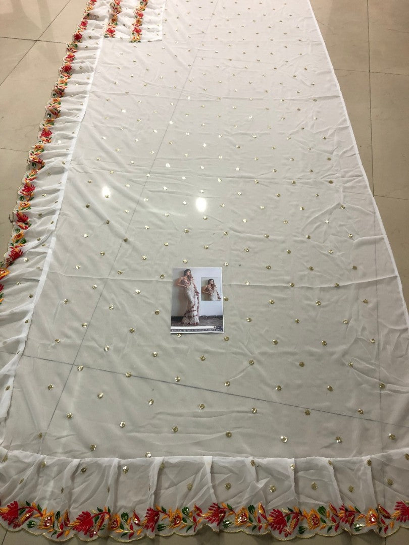 white multi threadwork embroidered ceremonial ruffle saree