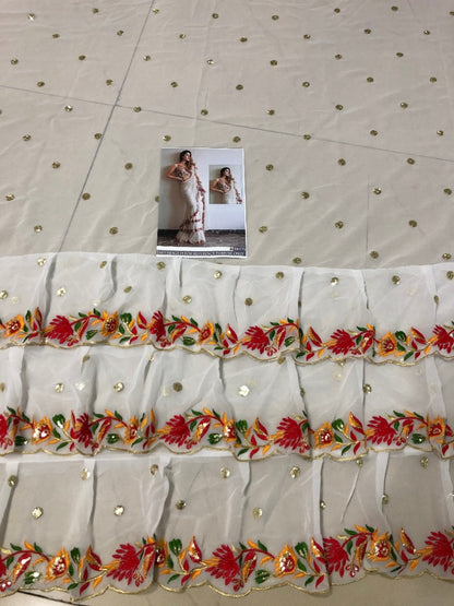 white multi threadwork embroidered ceremonial ruffle saree