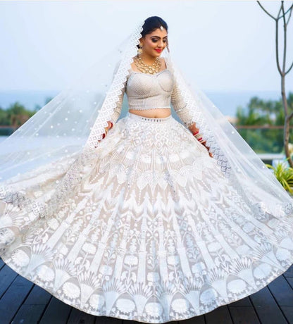 White net chain stitch embroidered wedding lehenga choli