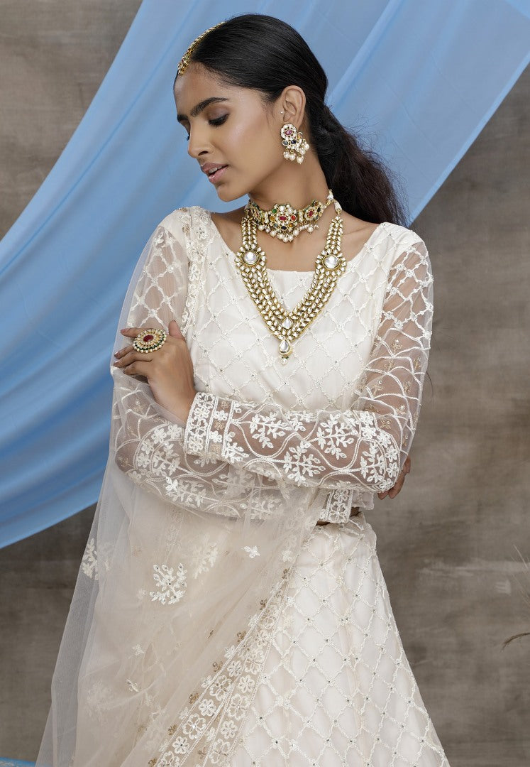 white net heavy embroidered wedding lehenga choli