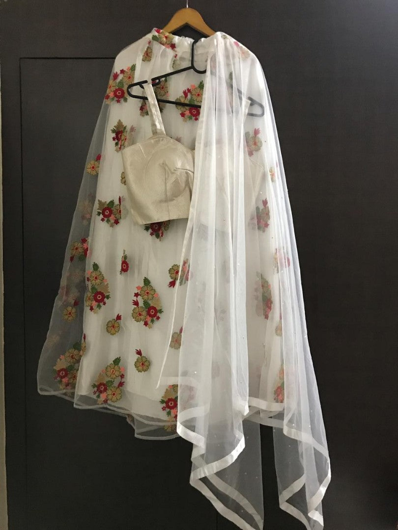 White net multicolor thread worked beautiful ceremonial lehenga