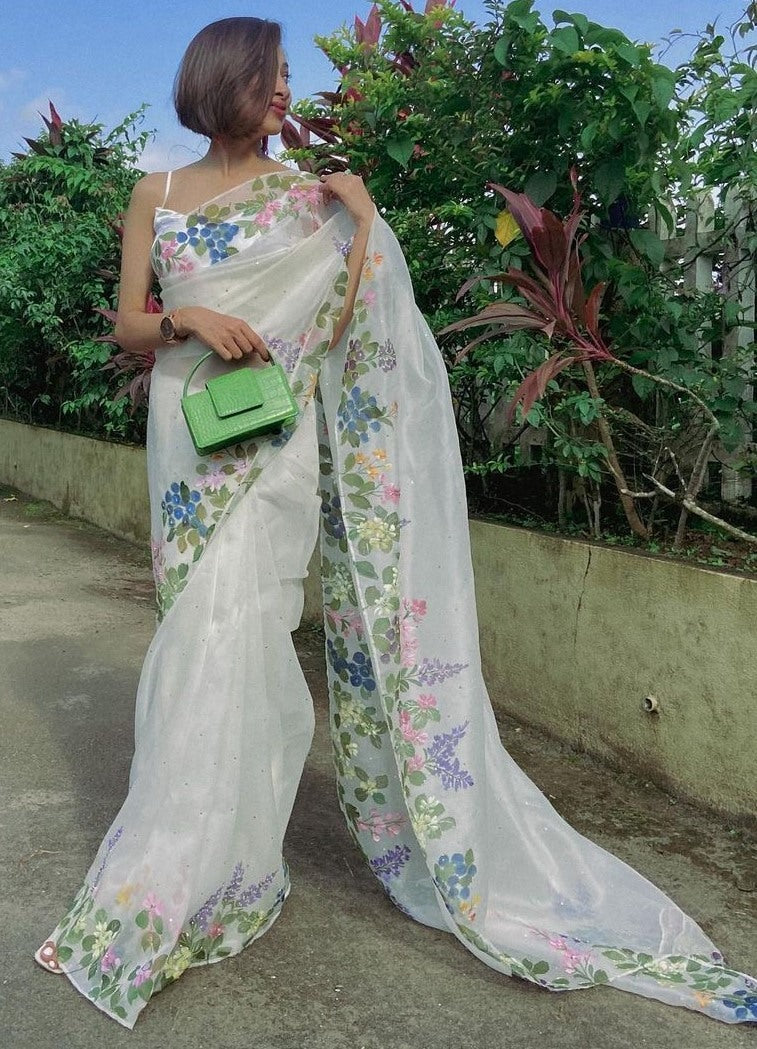 White organza print and hand worked saree