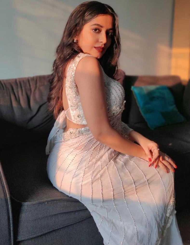 White organza silk zari embroidered and mirror work saree