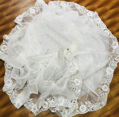 White organza silk zari embroidered and mirror work saree