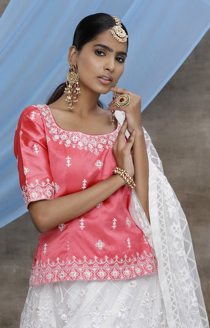 White silk art sequence embroidered party wear lehenga choli