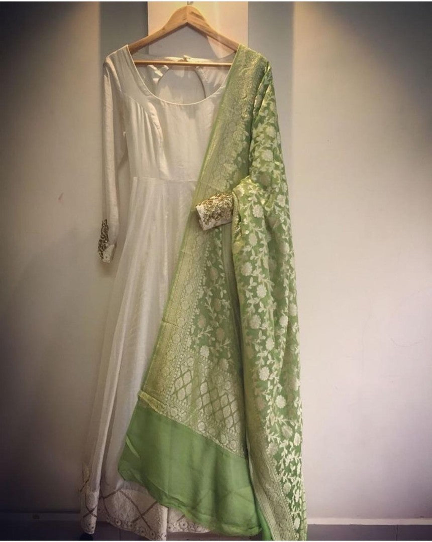 White silk plain anarkali suit with printed green dupatta