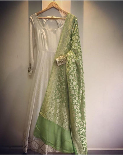 White silk plain anarkali suit with printed green dupatta