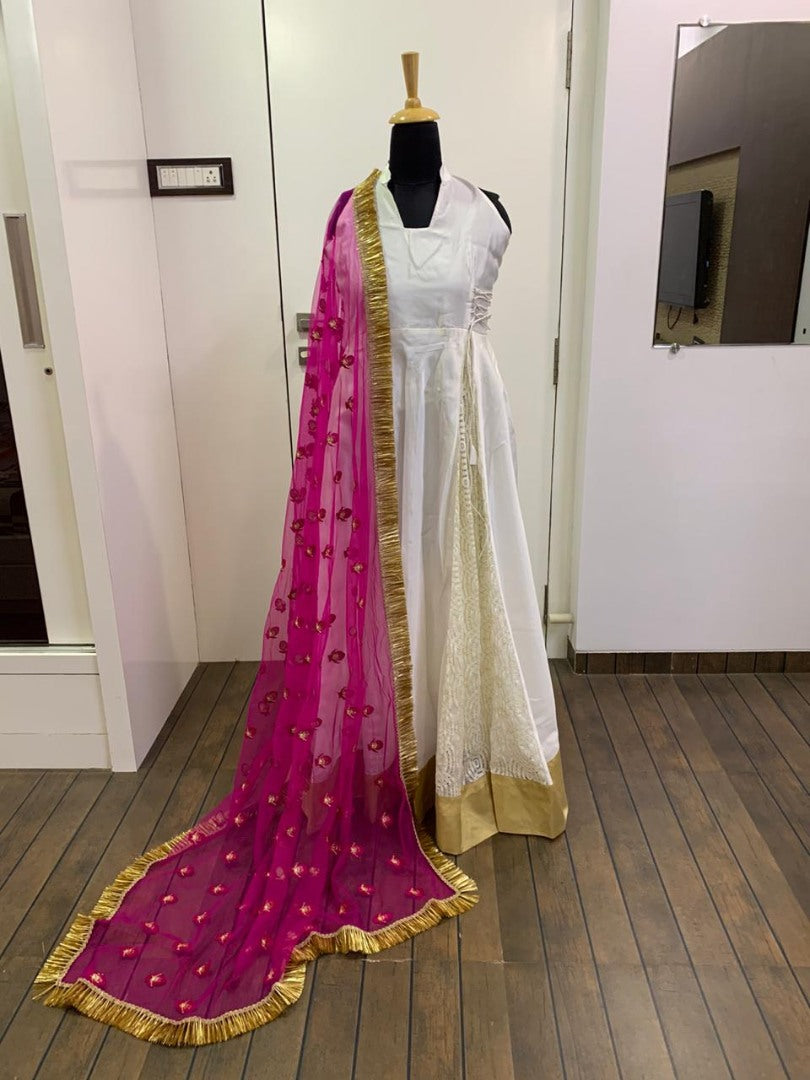 White tapeta silk gown with heavy thread work dupatta