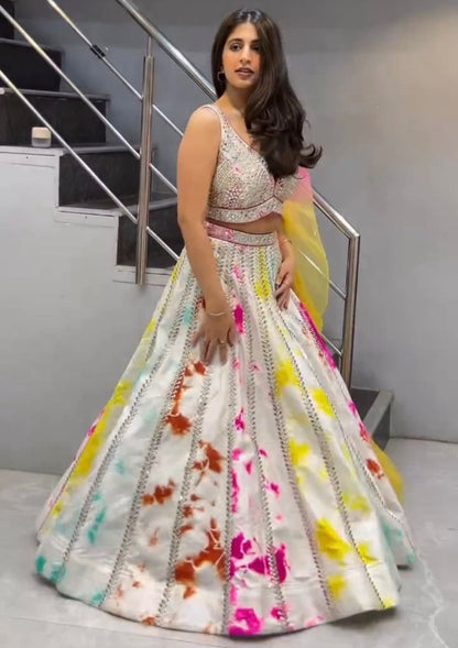 White tapeta silk multicolor print and sequence work wedding lehenga