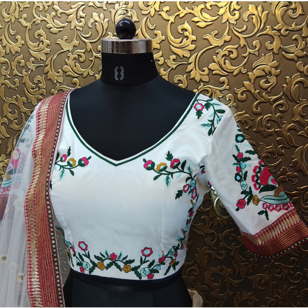 white tapeta silk multicolored heavy threadwork wedding lehenga choli