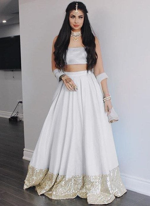 white tapeta silk sequence border partywear lehenga choli
