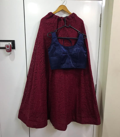 Wine maroon rassel net stylist partywear crop top lehenga