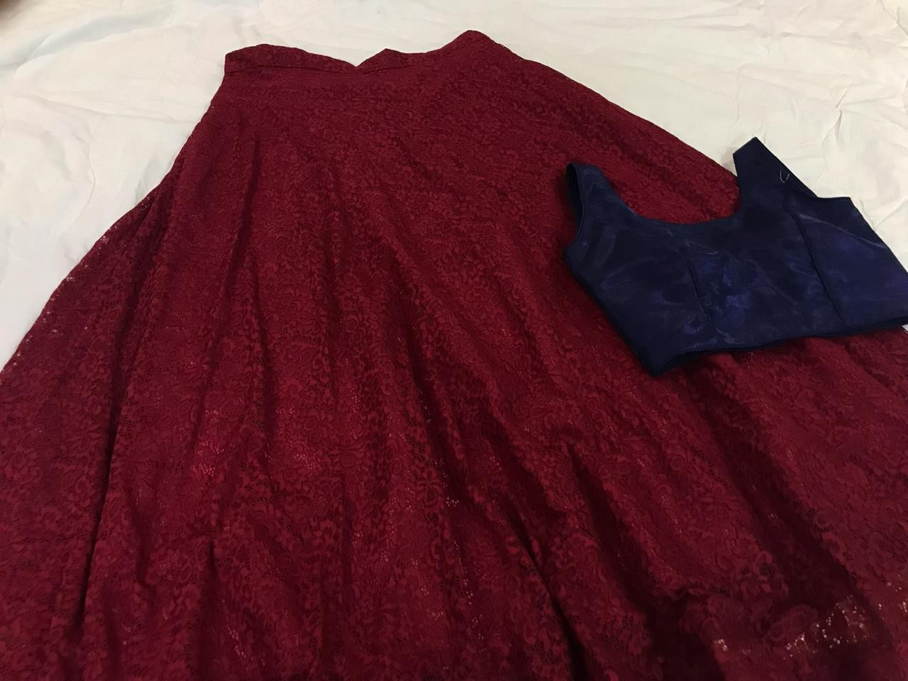 Wine maroon rassel net stylist partywear crop top lehenga