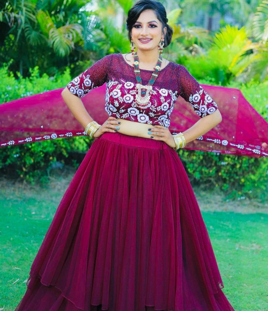 Wine soft net sequence embroidered work lehenga choli