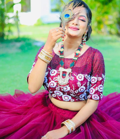 Wine soft net sequence embroidered work lehenga choli