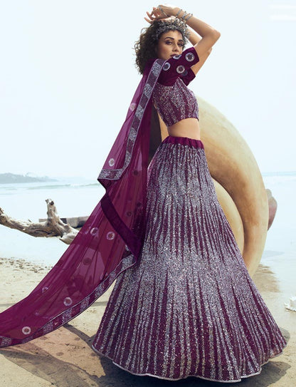 Wine soft net sequence work ceremonial lehenga choli