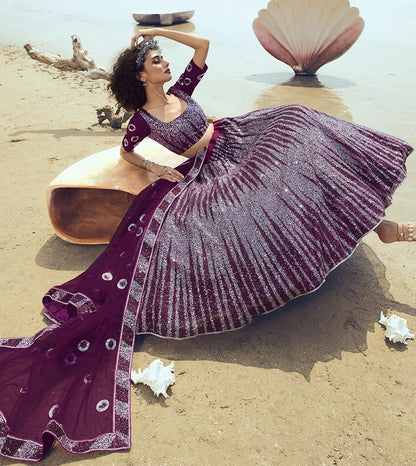 Wine soft net sequence work ceremonial lehenga choli