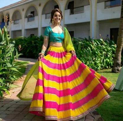 yellow and pink multicolored ceremonial lehenga