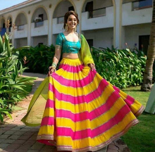 yellow and pink multicolored ceremonial lehenga