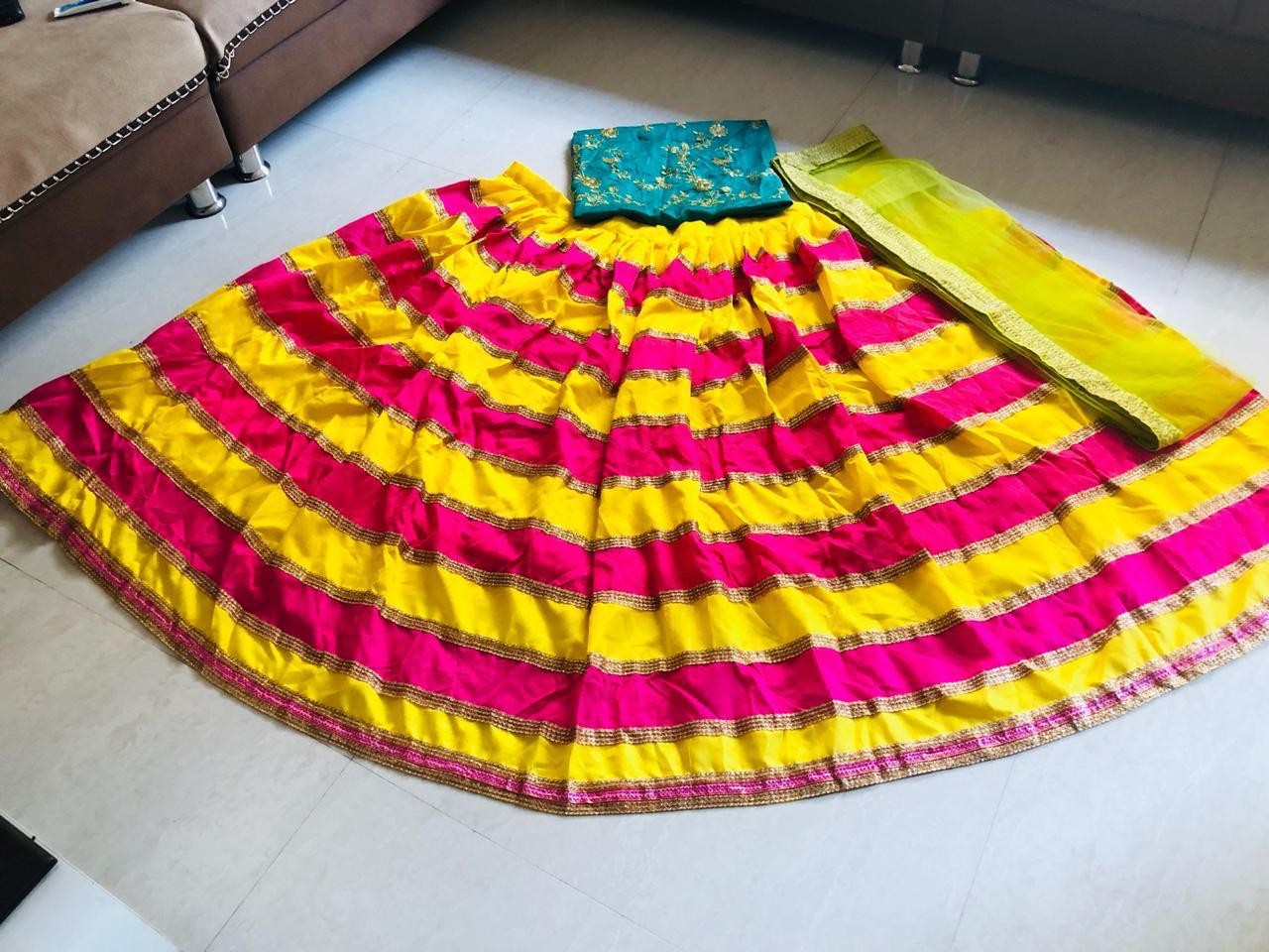 yellow and pink multicolored ceremonial lehenga