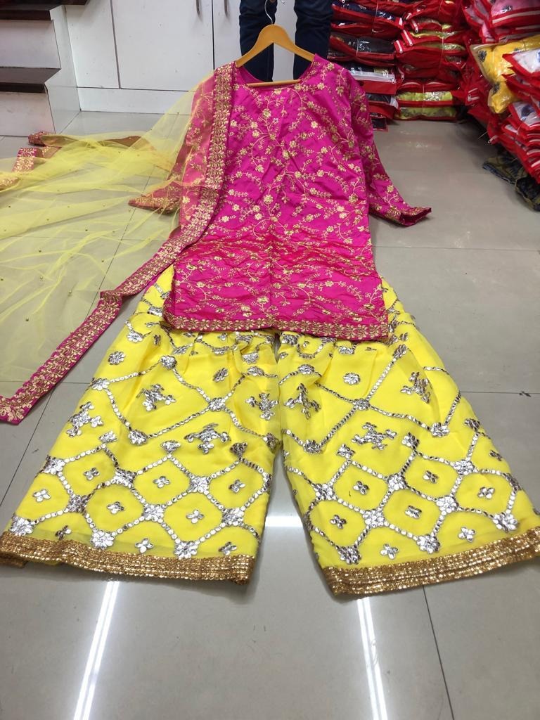 Yellow and pink tapeta silk embroidered plazzo salwar suit