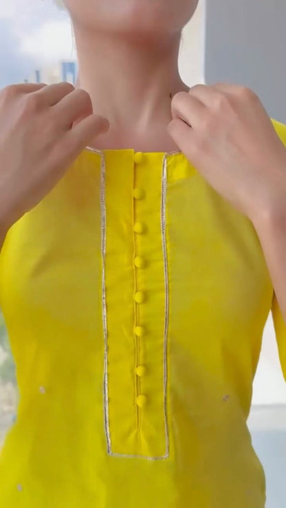 Yellow cotton moti work and printed sharara suit