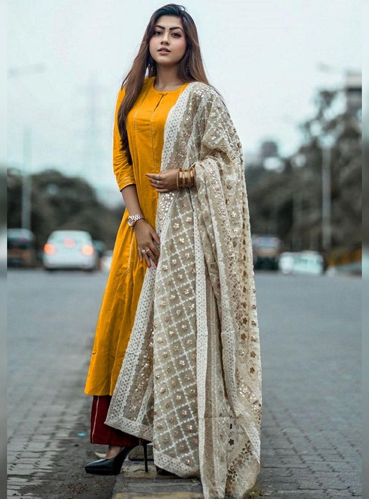 yellow cotton top and red plazzo suit with heavy dupatta