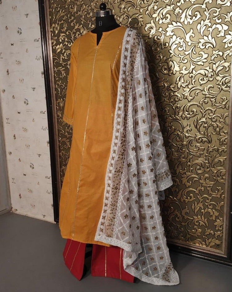 yellow cotton top and red plazzo suit with heavy dupatta
