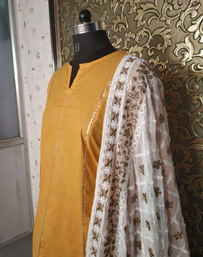 yellow cotton top and red plazzo suit with heavy dupatta