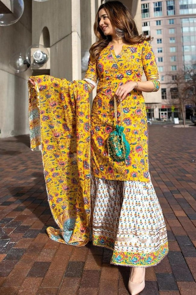 Yellow crepe silk digital floral printed work party wear plazzo suit