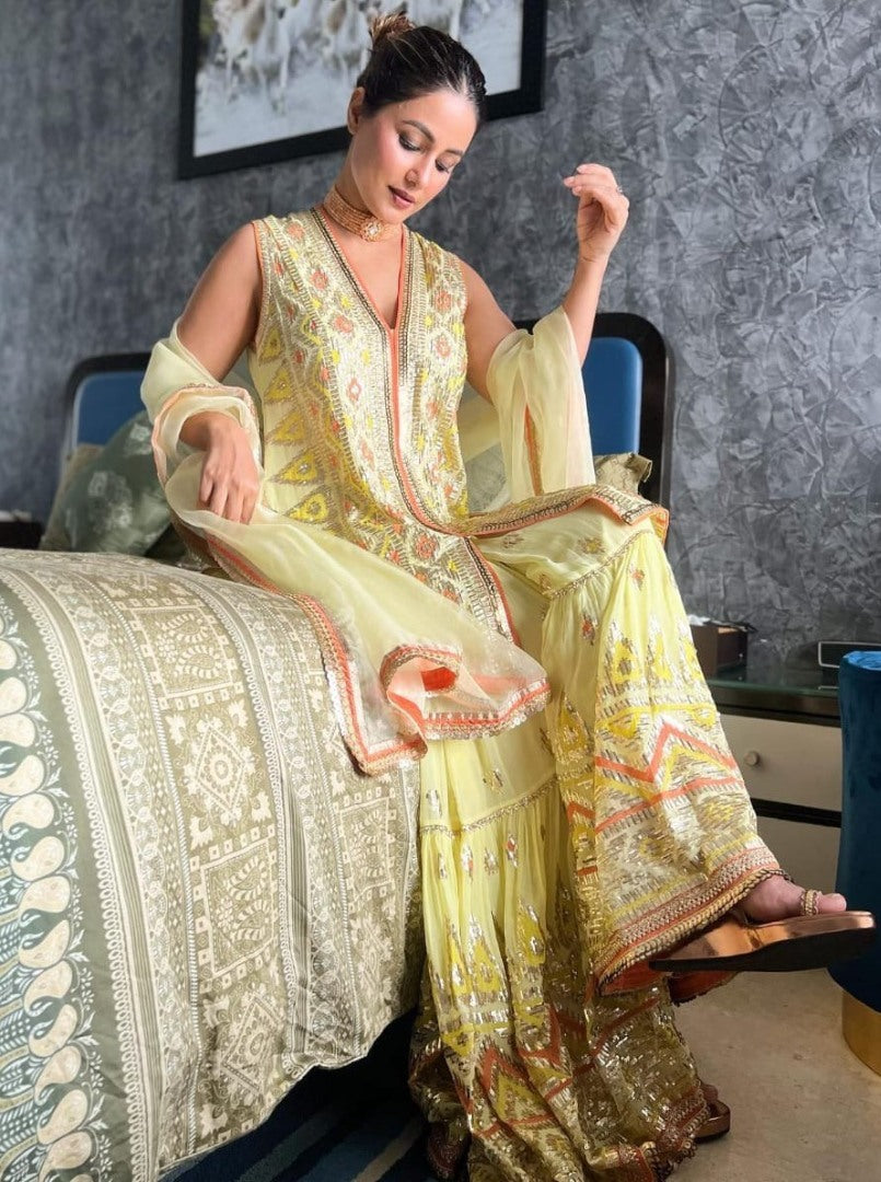Yellow designer heavy embroidered sharara suit