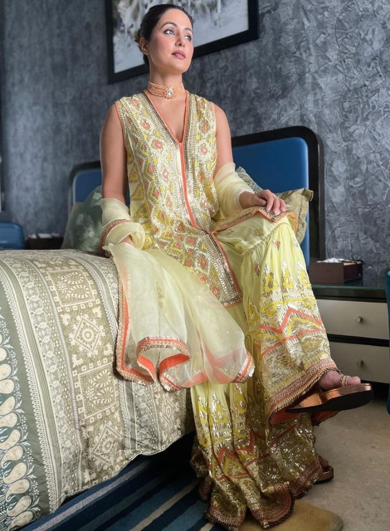 Yellow designer heavy embroidered sharara suit