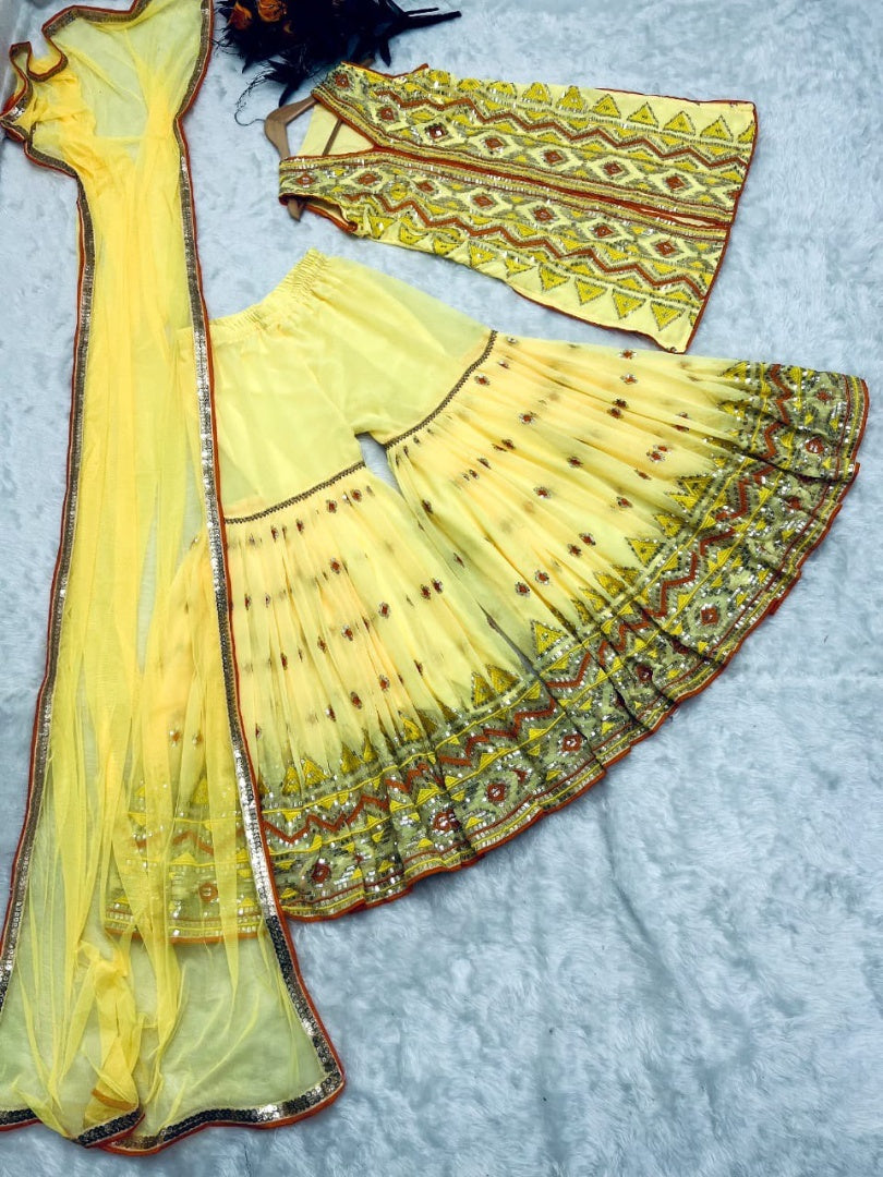 Yellow designer heavy embroidered sharara suit