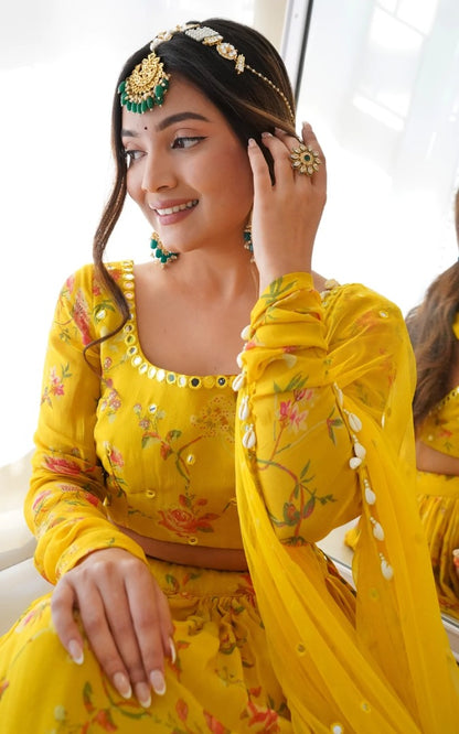 Yellow flower printed georgette lehenga choli for haldi ceremony