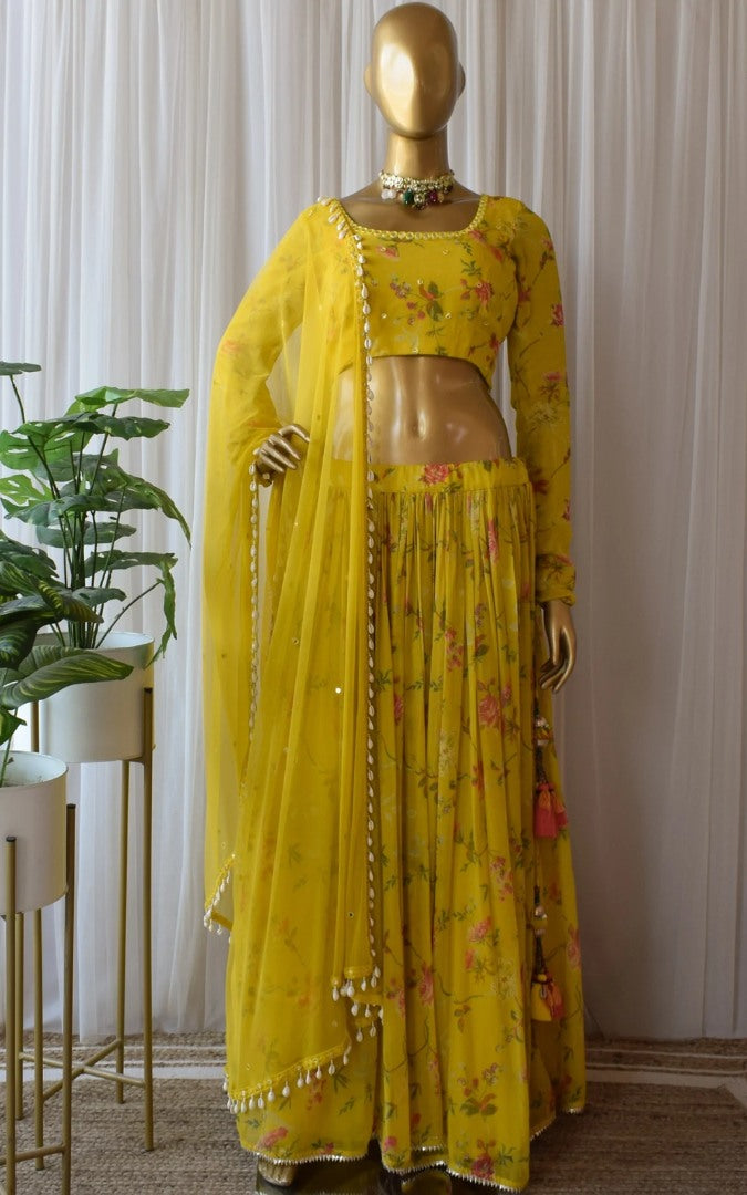Yellow flower printed georgette lehenga choli for haldi ceremony