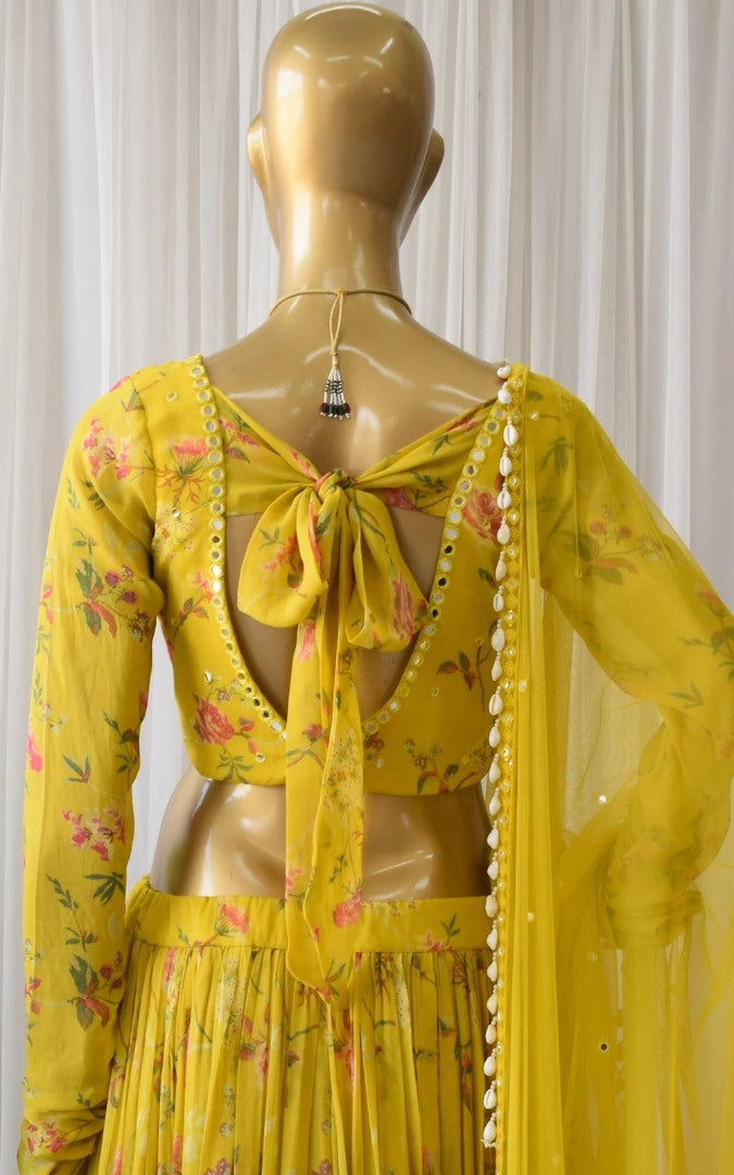 Yellow flower printed georgette lehenga choli for haldi ceremony
