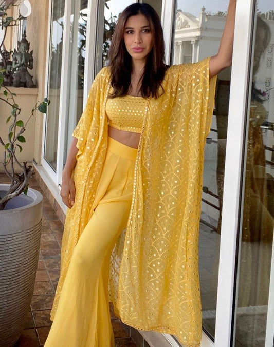 Yellow georgette big sequence work plazzo suit with shrug