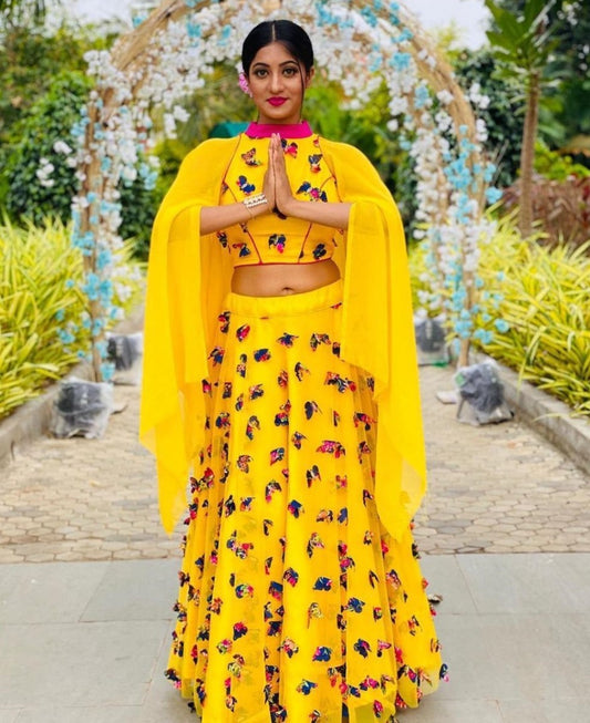 Yellow georgette butterfly embelished crop top lehenga